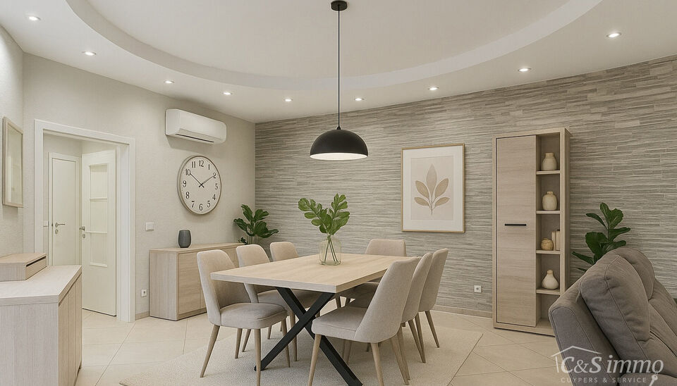 Dit appartement op de tweede verdieping werd recent gerenoveerd. Via de inkomhal bereik je vooraan de lichte woonkamer op tegelvloer. Aansluitend de ingerichte keuken uitgerust met gaskookfornuis, dubbele spoelbak, oven, koelkast met vriesvak en voldoende