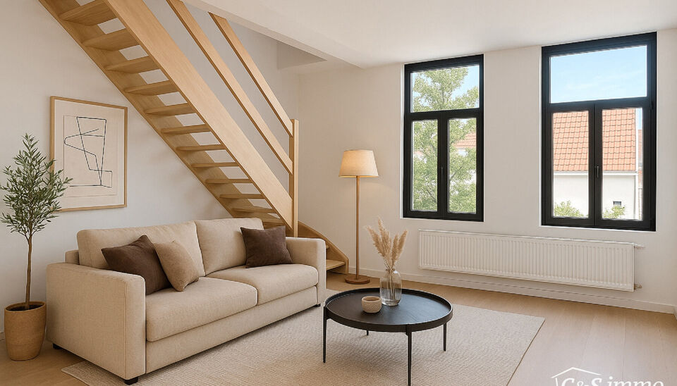 Tip top afgewerkt duplex appartement met terras en 2 slaapkamers.  Dit appartement biedt een perfecte balans tussen comfort en stijl, gelegen in de levendige en vernieuwende wijk Stuivenberg. Bij binnenkomst inkomhal met een apart toilet. De lichtrijke le